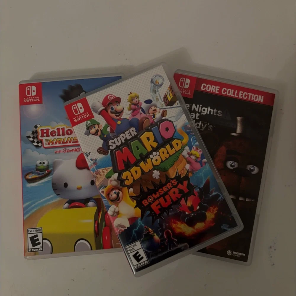 Nintendo Switch with Vibrant Purple and Yellow Joy-Con free games